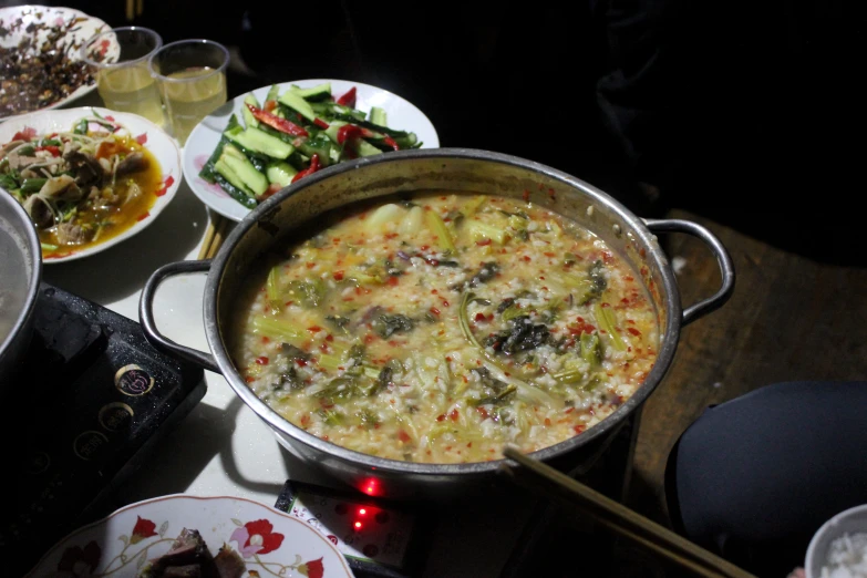 a pot of food is sitting on the table