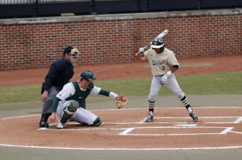 a batter, catcher and umpire on a baseball field