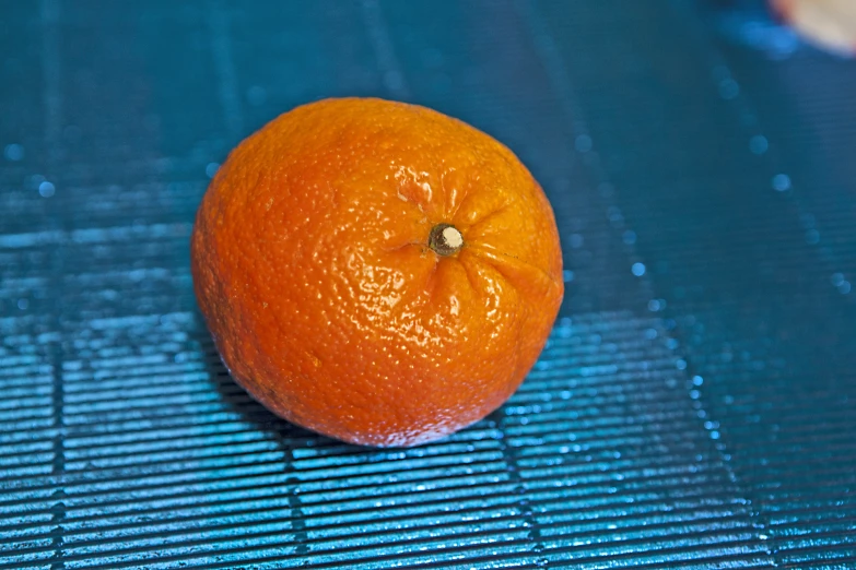 the orange has been placed in the middle of the picture