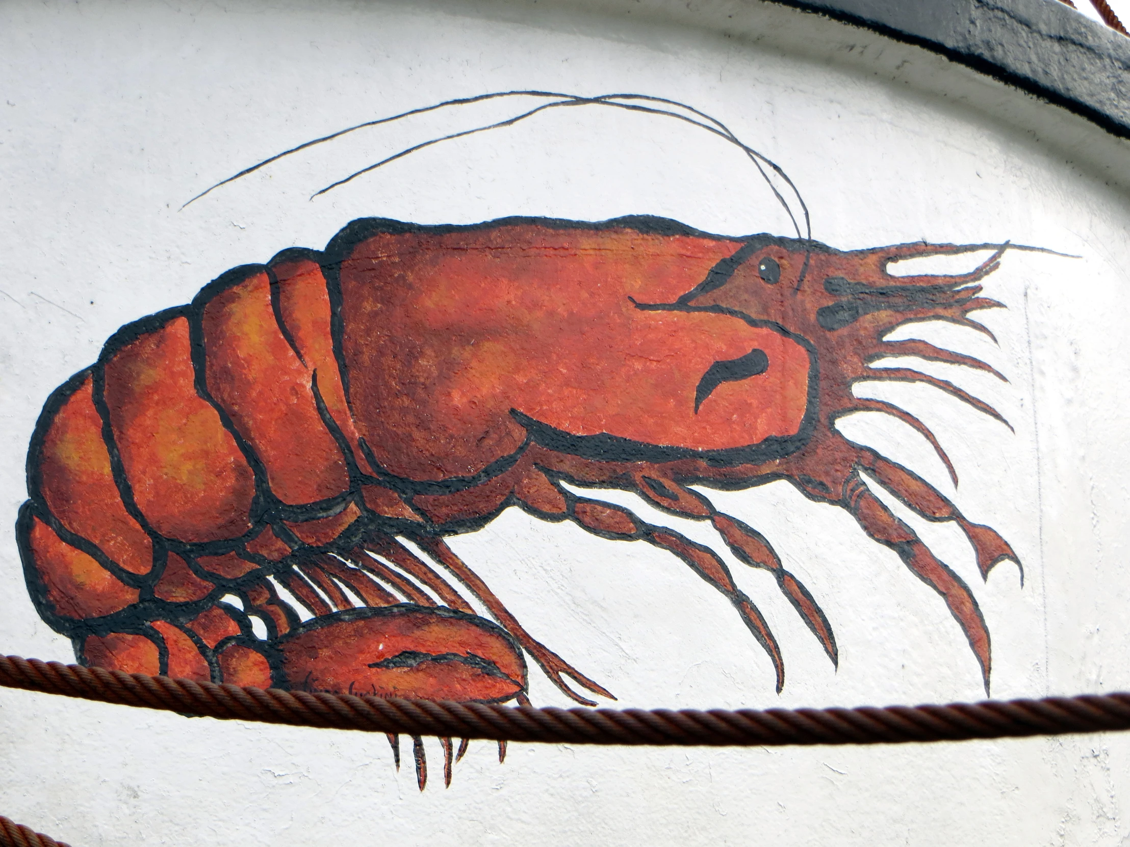 a painting of a giant red fleafish on a white wall
