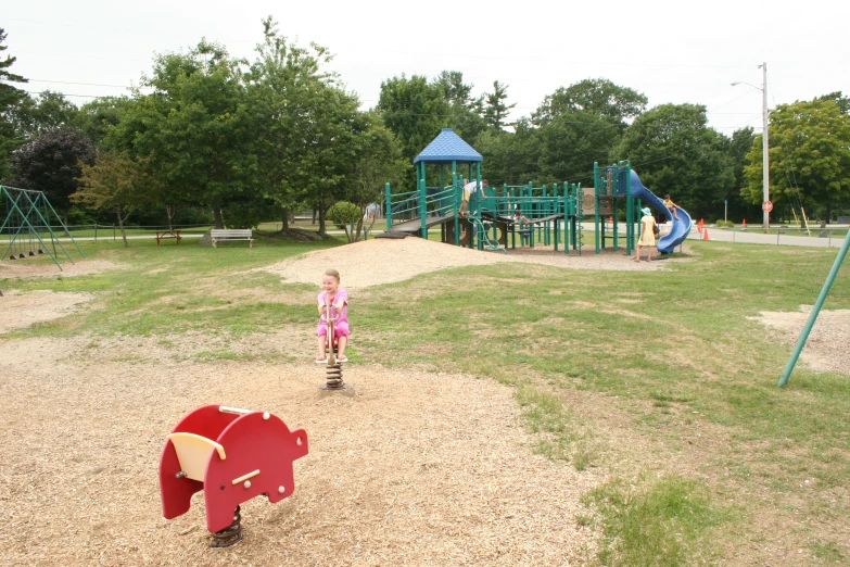 there is a child playing in the playground