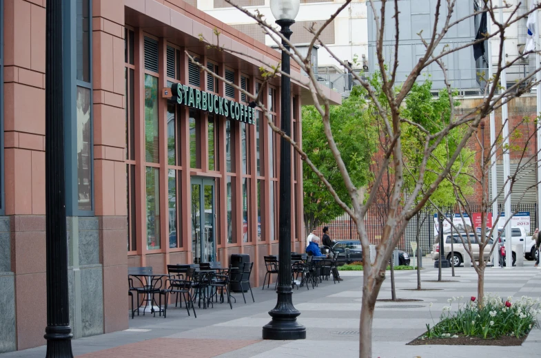 a view of an outside cafe looking toward the street