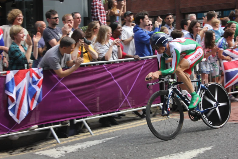 the cyclist is about to make his way down the road