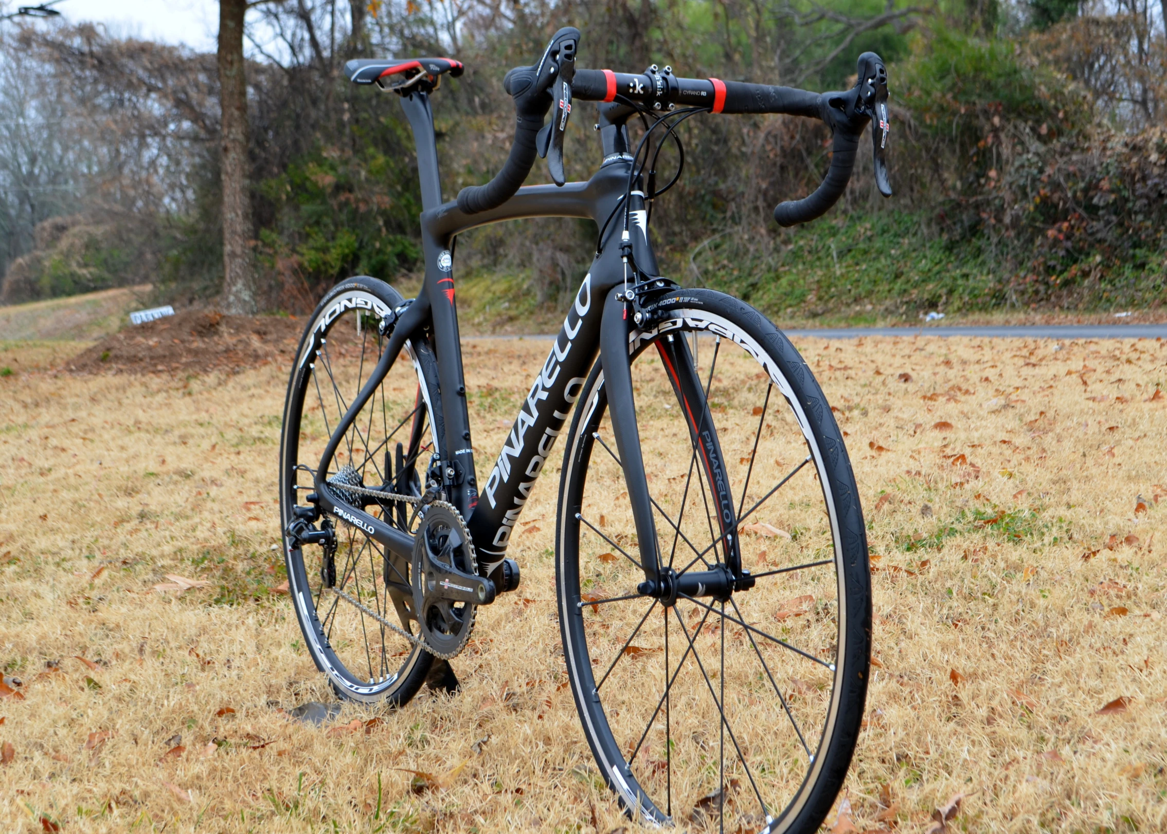 a close up of a bike on a grassy field