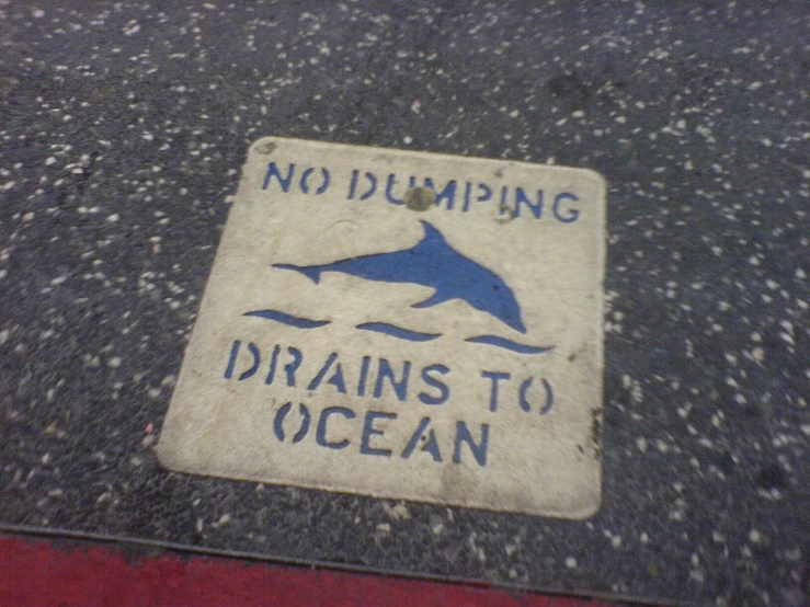 there is no dumping on the ocean sign on the street