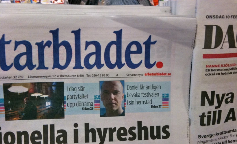 a newspaper is being displayed in a newspaper advertit
