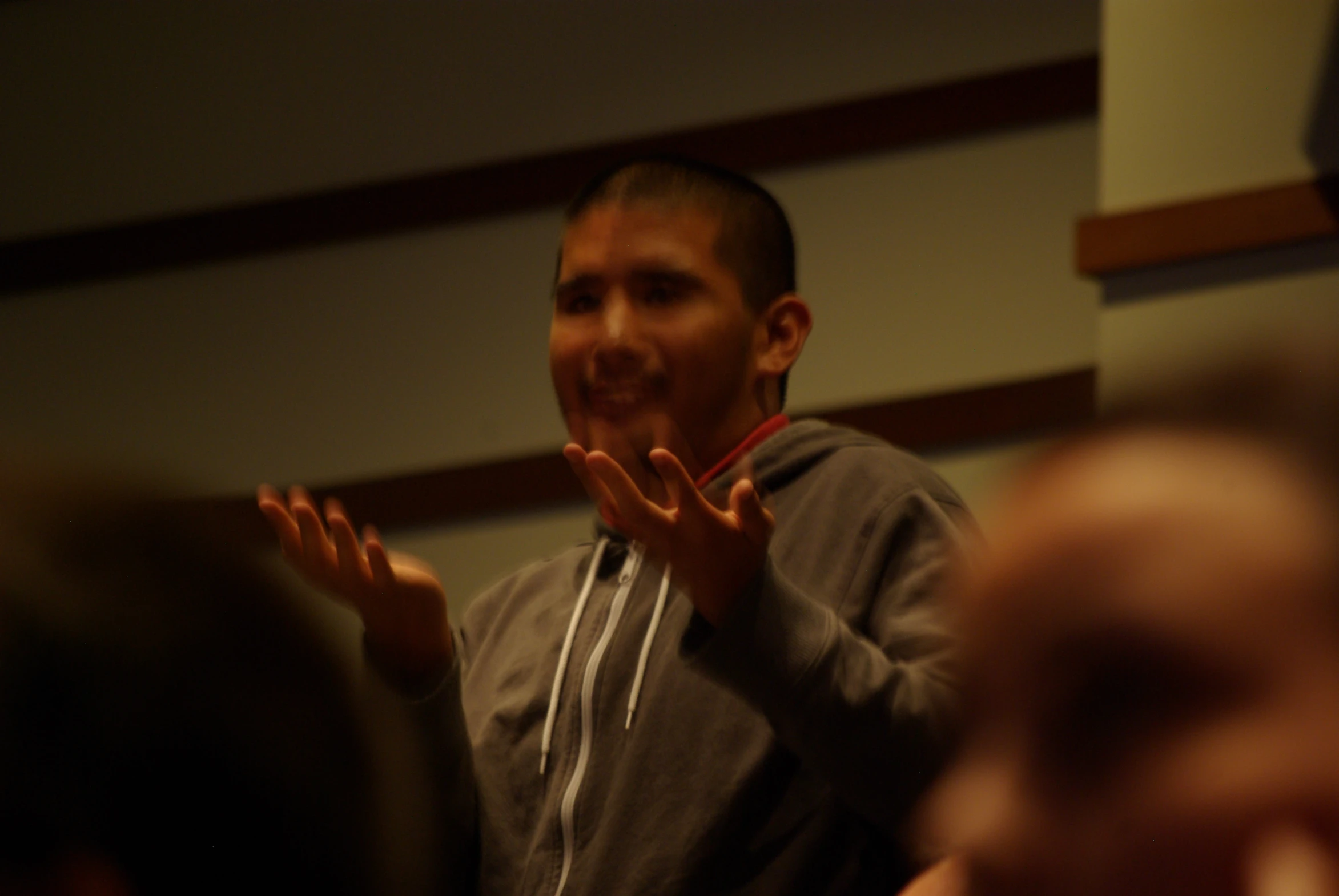 a man who is speaking to a group