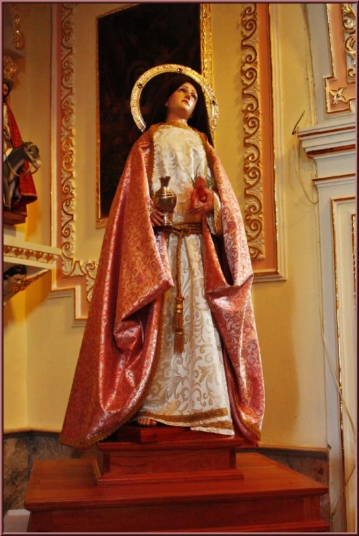 a little statue of the mary queen in a cathedral