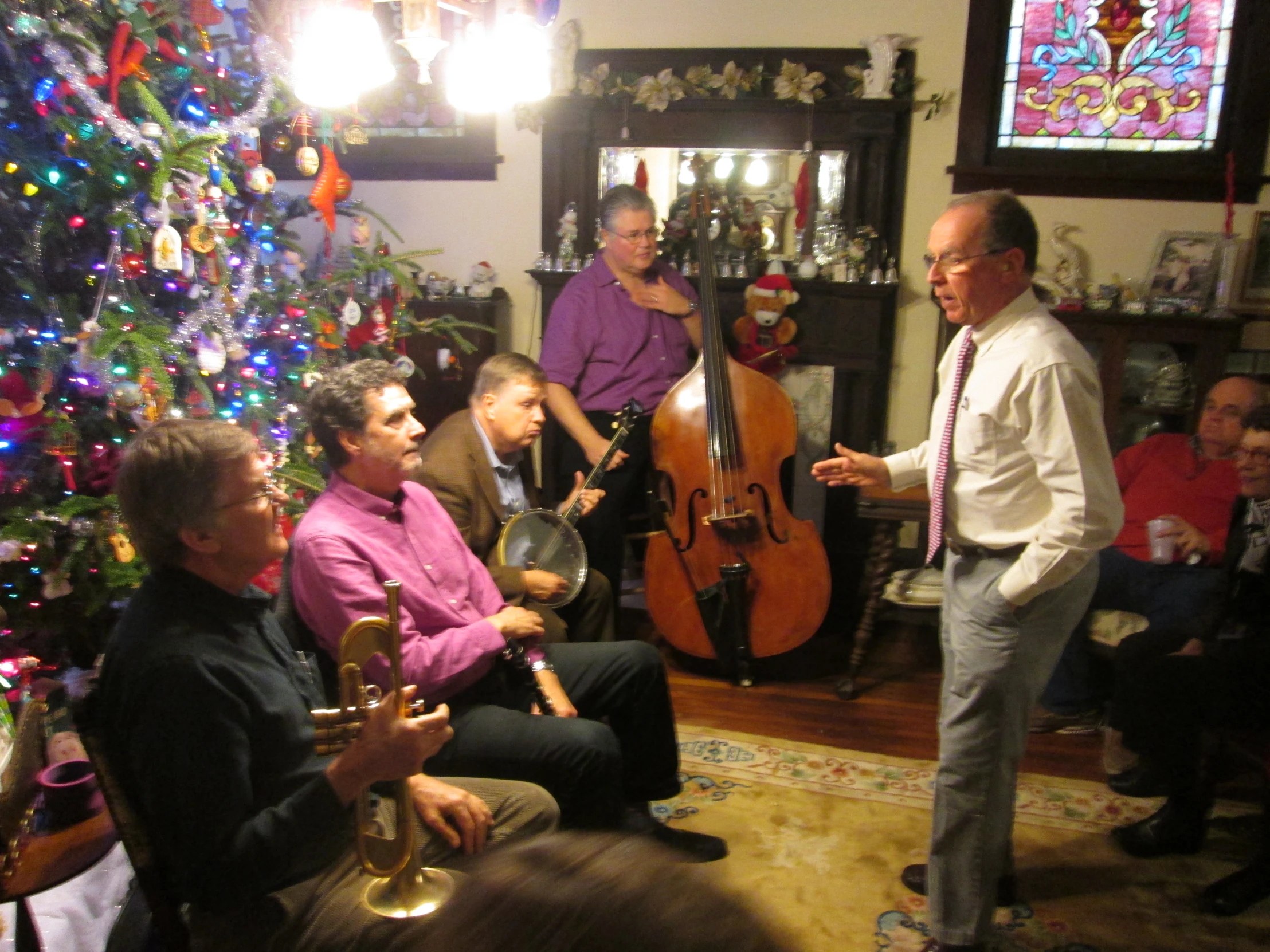 an image of a man playing an instrument in the living room