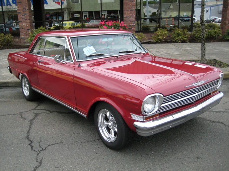 red chevy parked in the parking lot