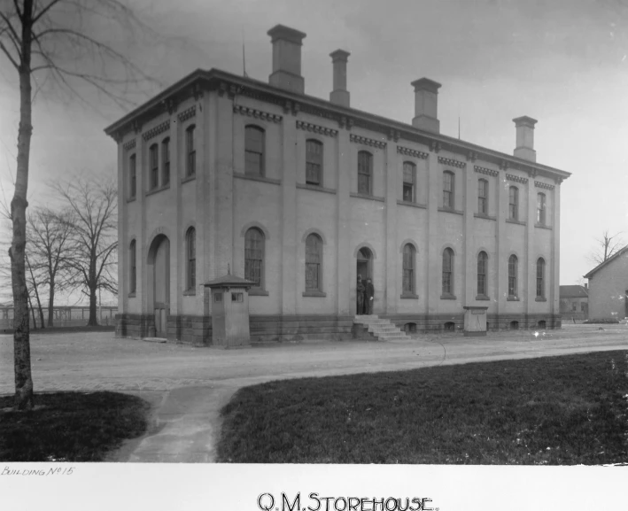 this is a large brick building with two chimneys