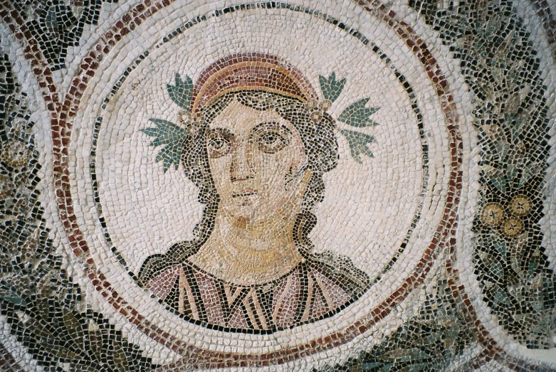 the head and shoulders of a mosaic of a woman