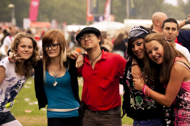 a group of people taking a picture with their camera