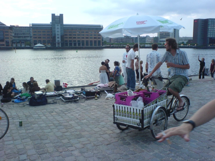 a man is riding a bike with baskets on it