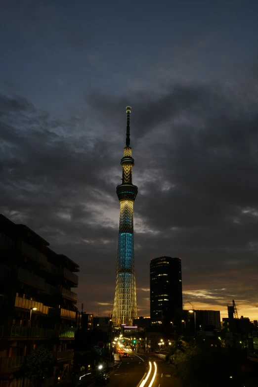 a very tall building that is lit up in the sky