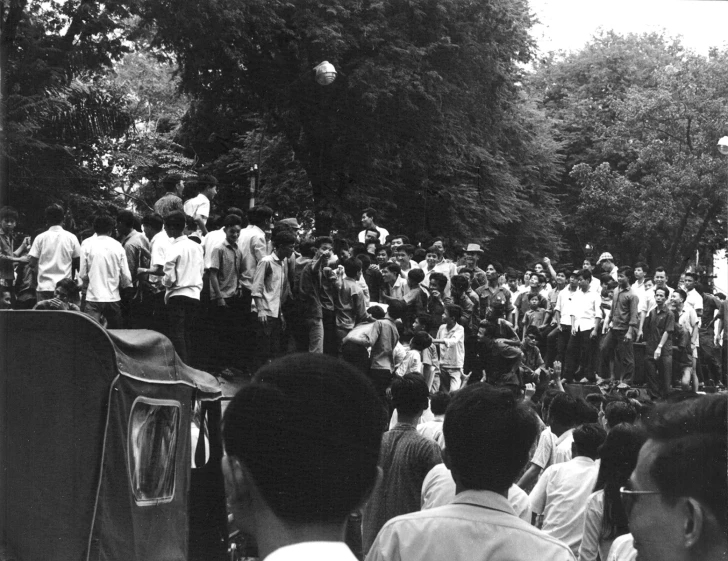 black and white po of crowd at outdoor event