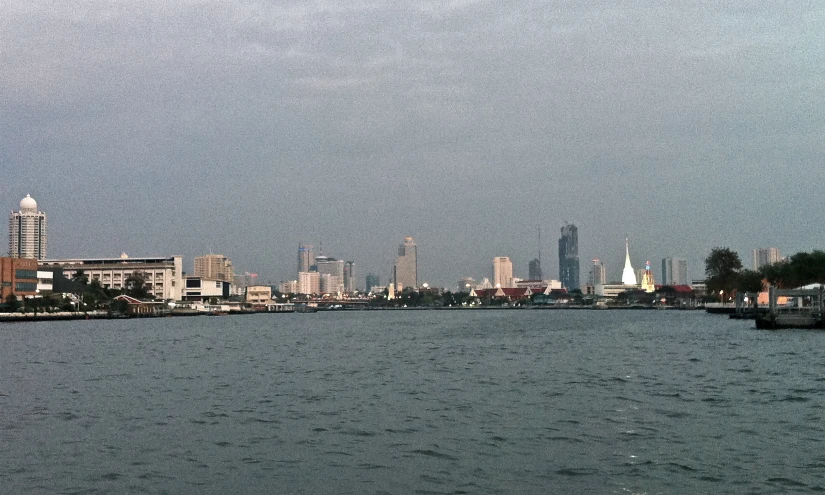 a body of water with boats docked on the side of it