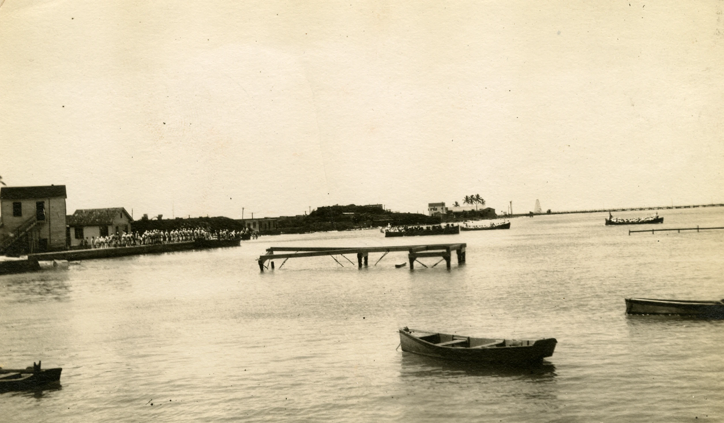 the boat is in the water near the dock