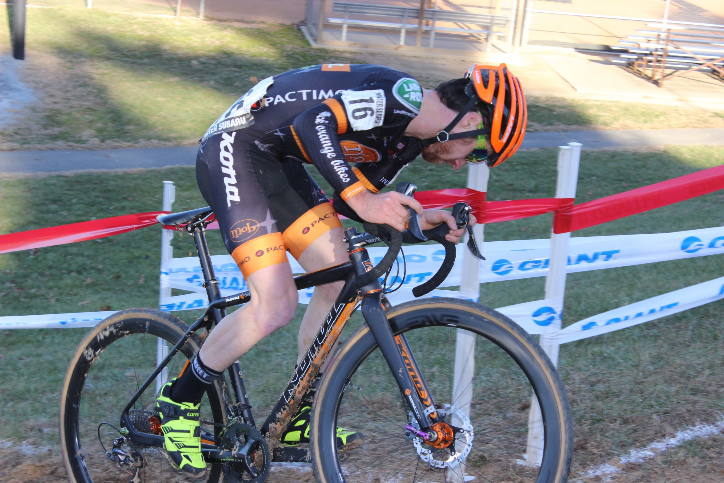 cyclist in a bib on a race track