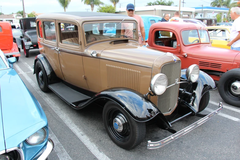 antique car on display at public event for visitors