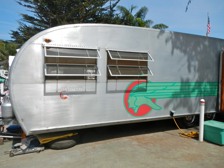 the front of a large trailer with a painting on it