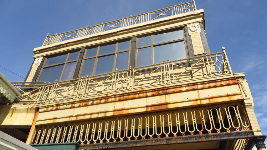 an old building with some balconies on the outside