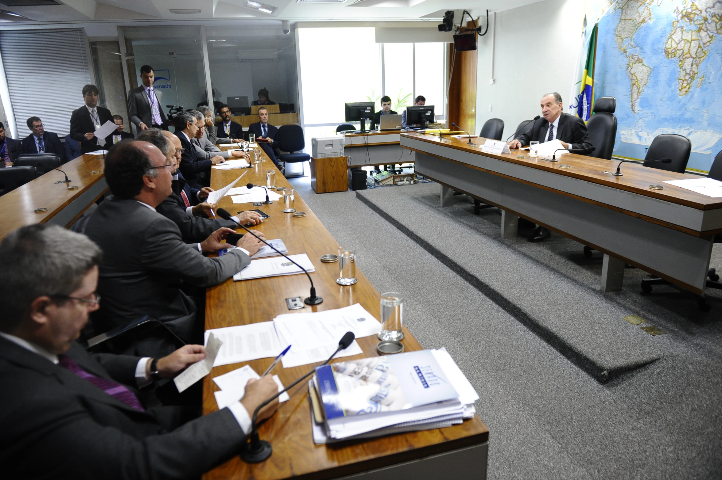 the business men are in discussion during a meeting