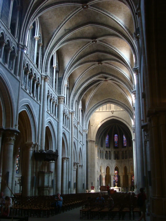 an image of the inside of a cathedral with stone columns