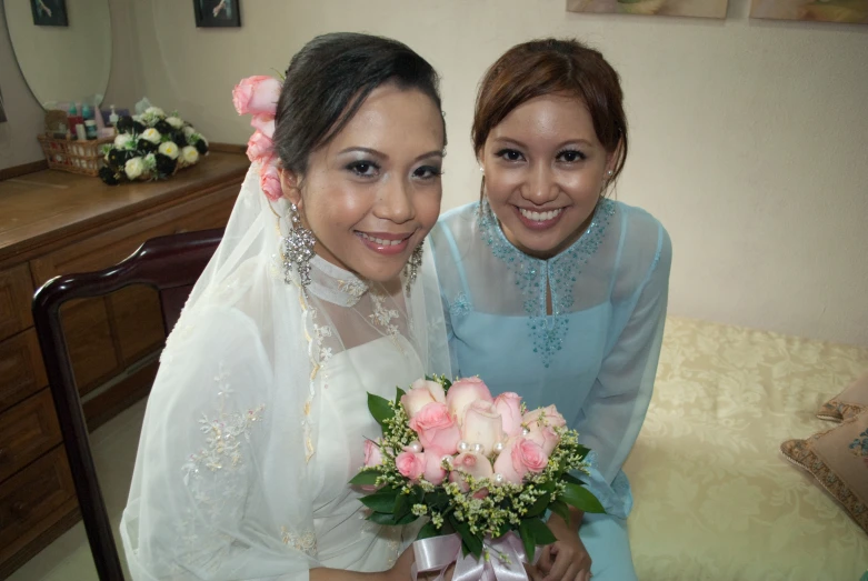 a bride is getting ready to walk down the aisle of the church