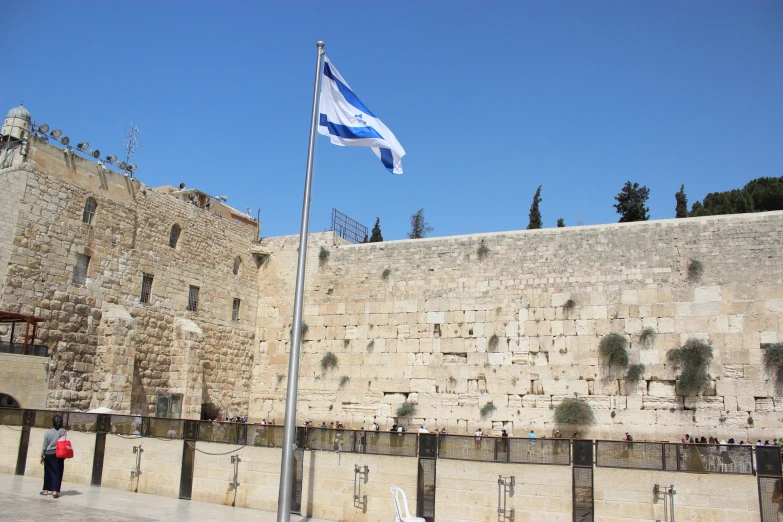 the flag flies high on the western wall