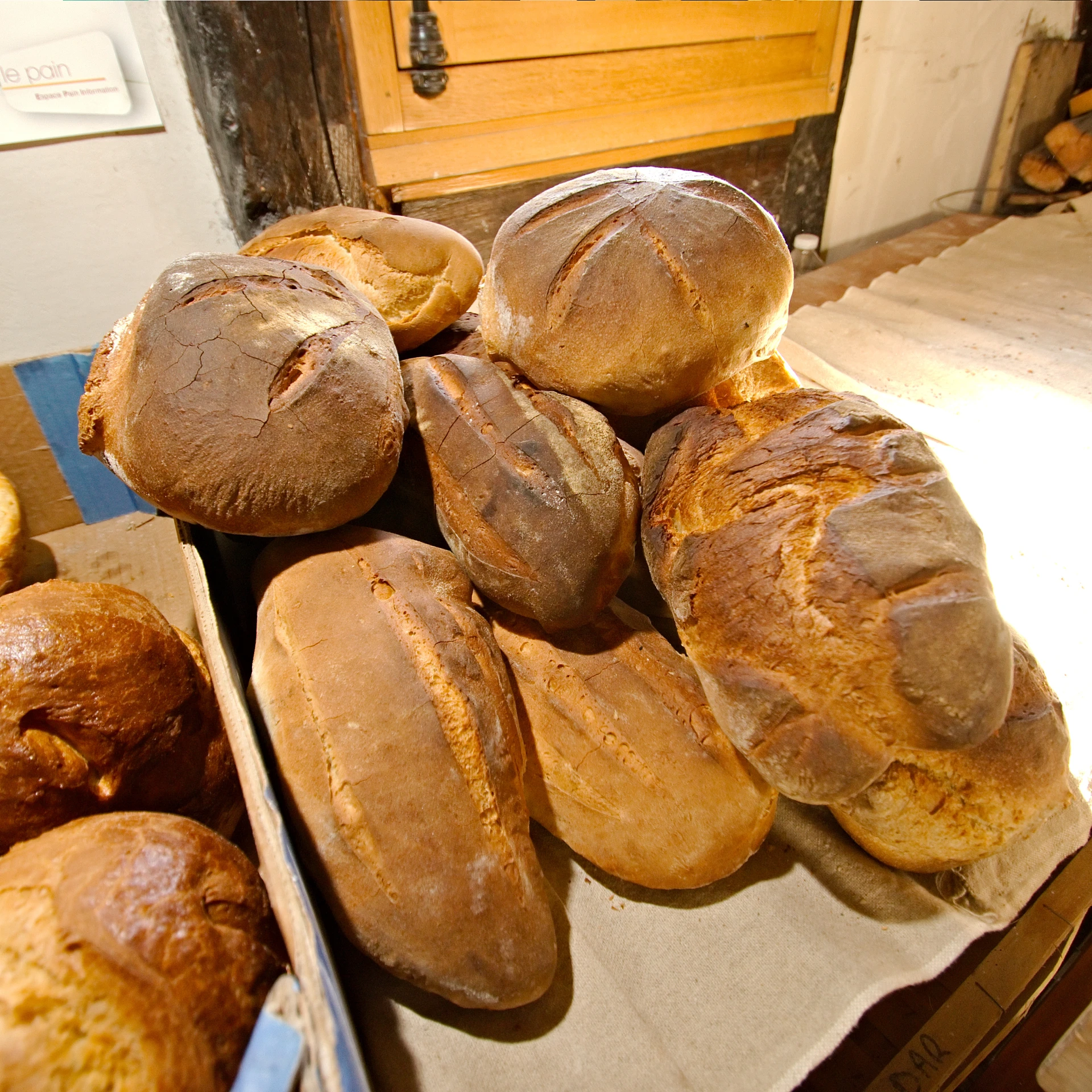 several rolls and rolls of different types on display