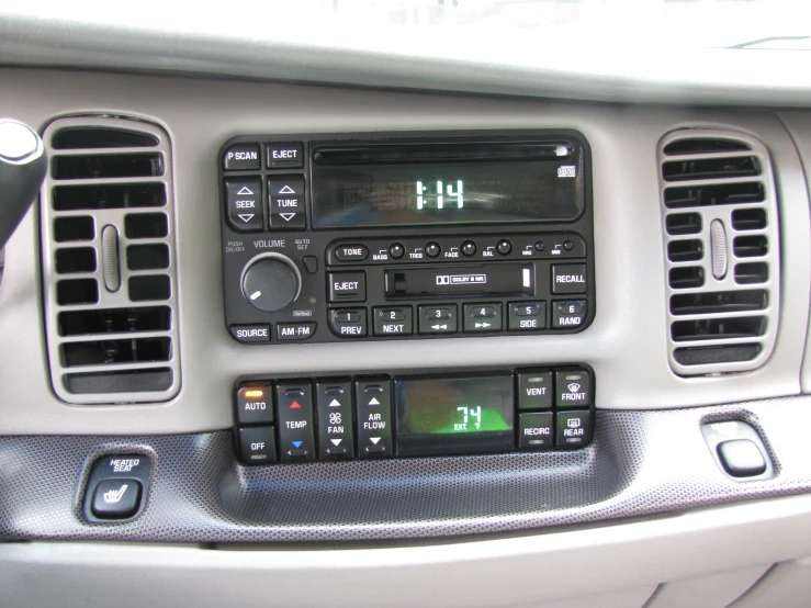 a vehicle radio has the digital display on it