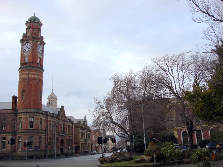 there is a large building with a tower and a clock in the center