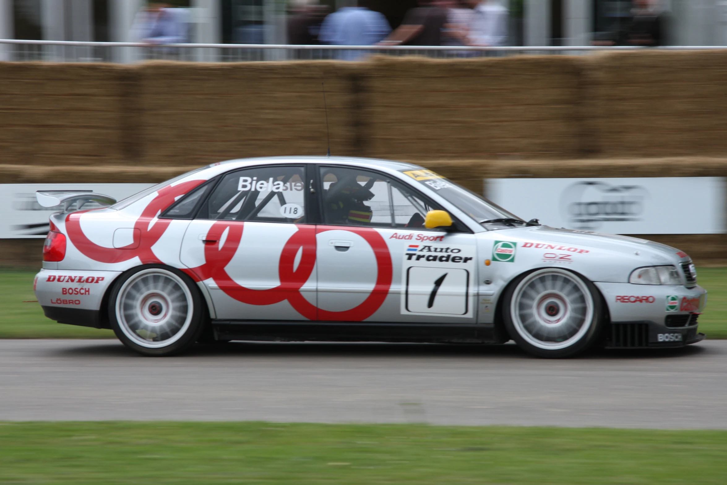 a racing car with a red coca cola can painted on it