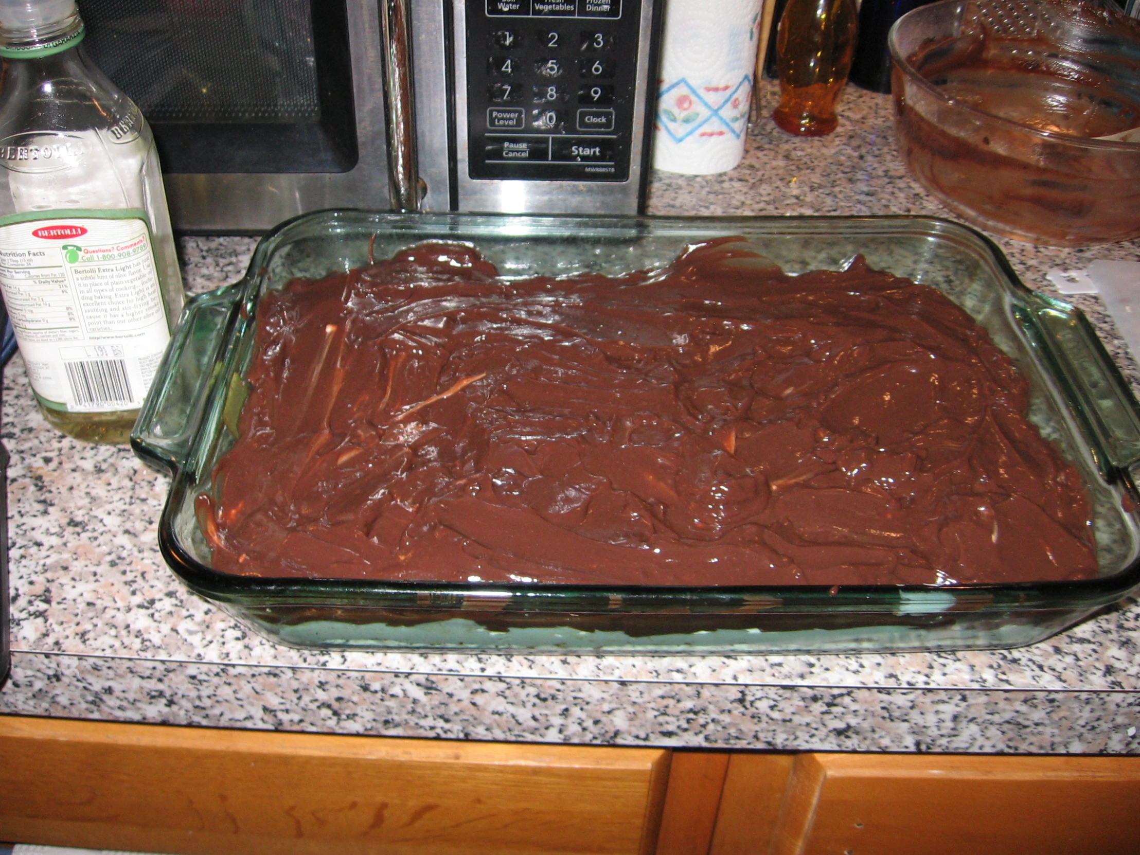 a chocolate cake in a pan ready to be cooked