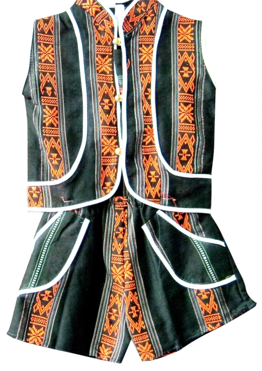a woman's vest with tribal designs on the back