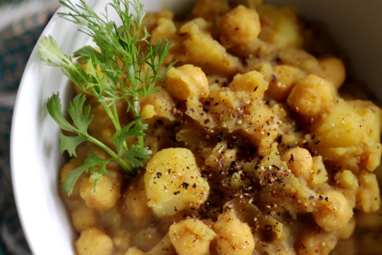 closeup of a white bowl filled with food