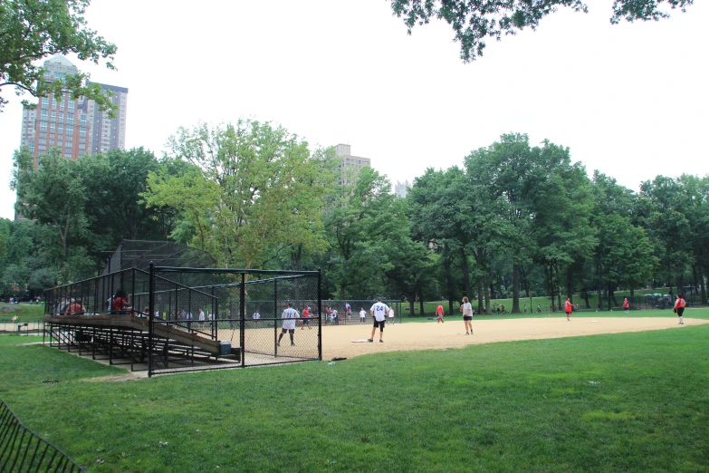 a baseball team playing ball on the field