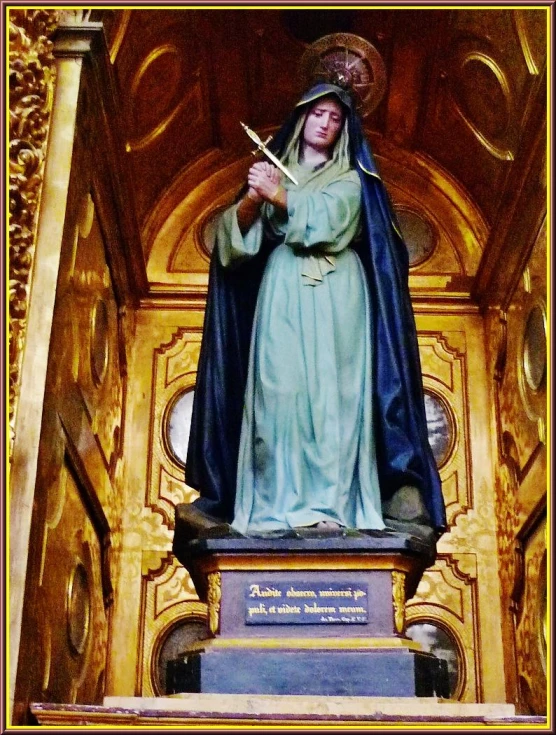 the statue of saint mary in a church