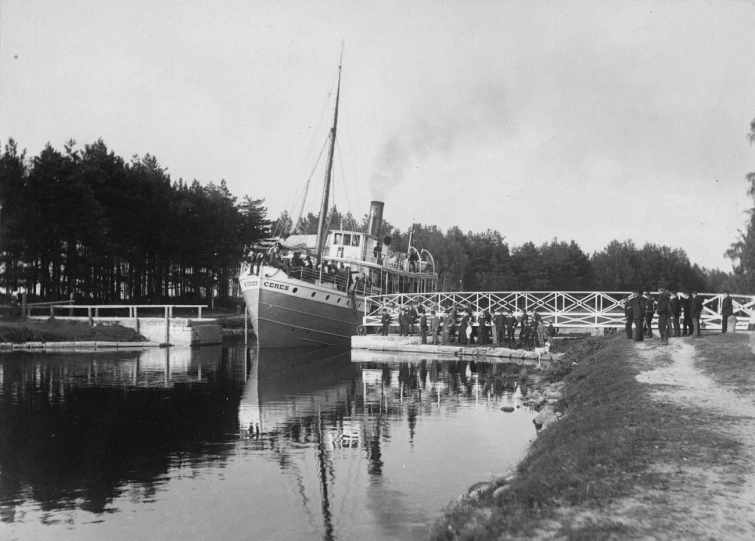 a boat is docked on the water next to another boat