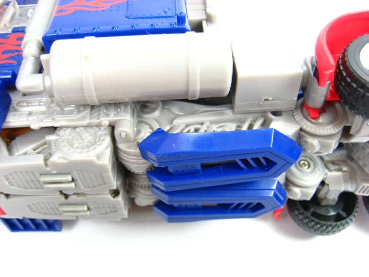 the plastic toy vehicle is displayed with different tires