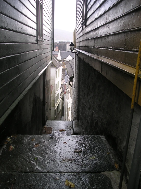 an open door leading down a street at a side street