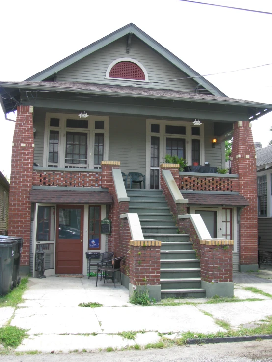 an old style house with some steps to the roof