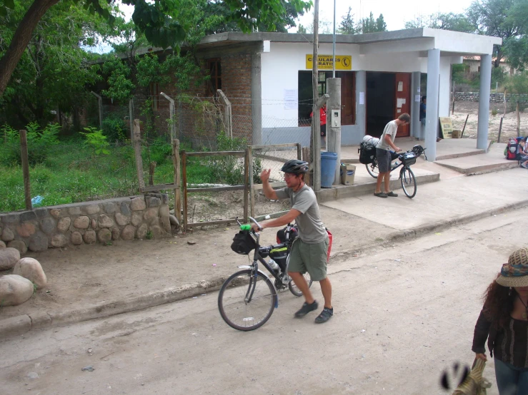 a person with a bike on a street