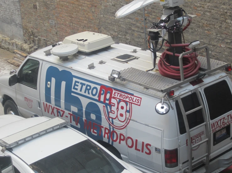 a truck with some radio equipment on the top of it