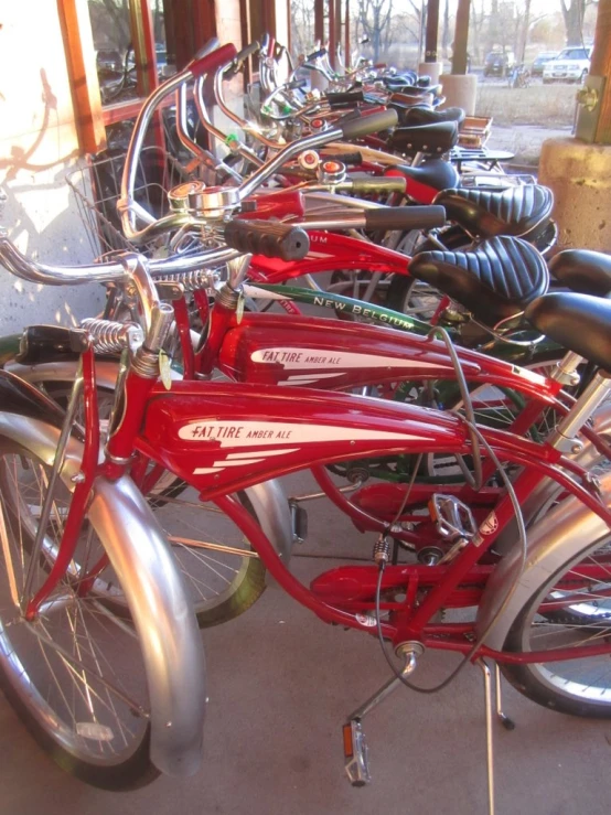 a bunch of bikes parked next to each other