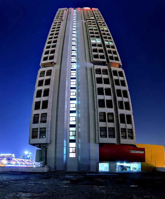 the tall building is very futuristic and modern