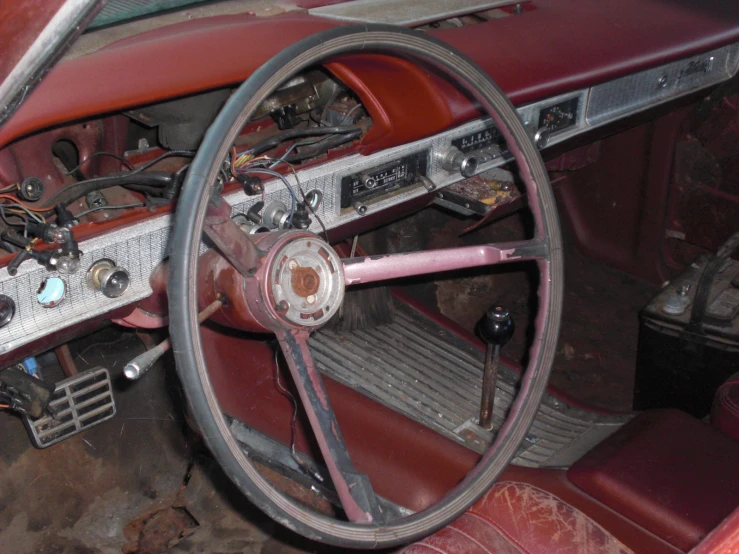 the interior of a car showing its instrument controls and radio
