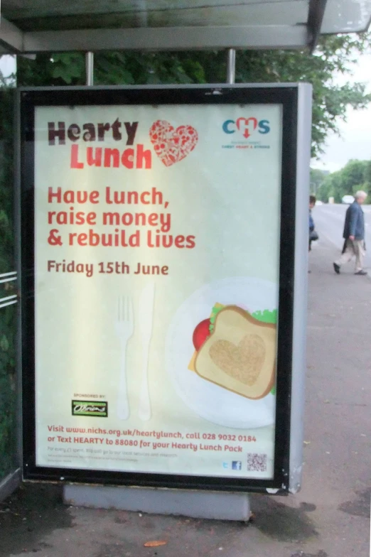 a sign with a poster on it stating the lunch