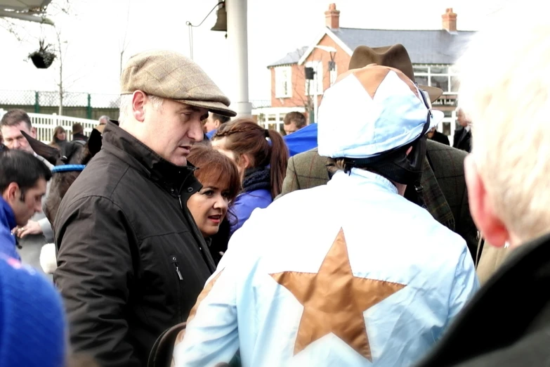 people are gathered together wearing star shaped clothing